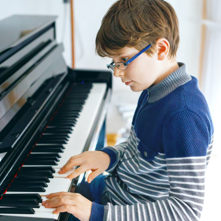 boy playing piano